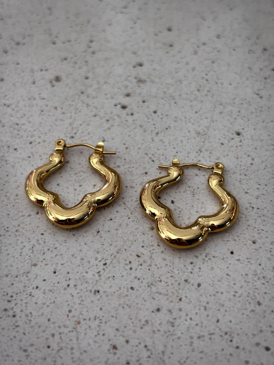 Aretes Goldie Church